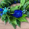 Corona di alloro con rose blu
