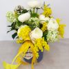 Composizione in box di mimosa per la festa della donna