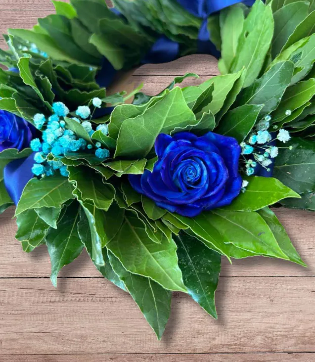 Corona di alloro con rose blu